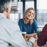 Insurance agent smiling at clients